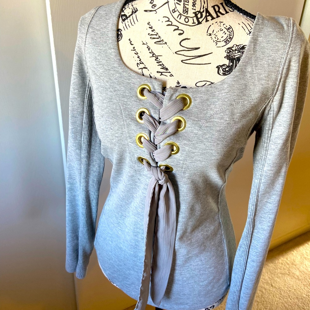 Free People Lace up front sweatshirt with ribbing on the sides and under the arm